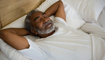 Man sleeping on his back