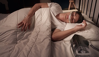 Man using combined therapy for sleep apnea